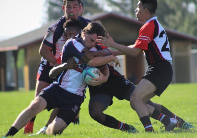 SRJC Rugby Player Louis Avoiding Being Tackled with the Ball